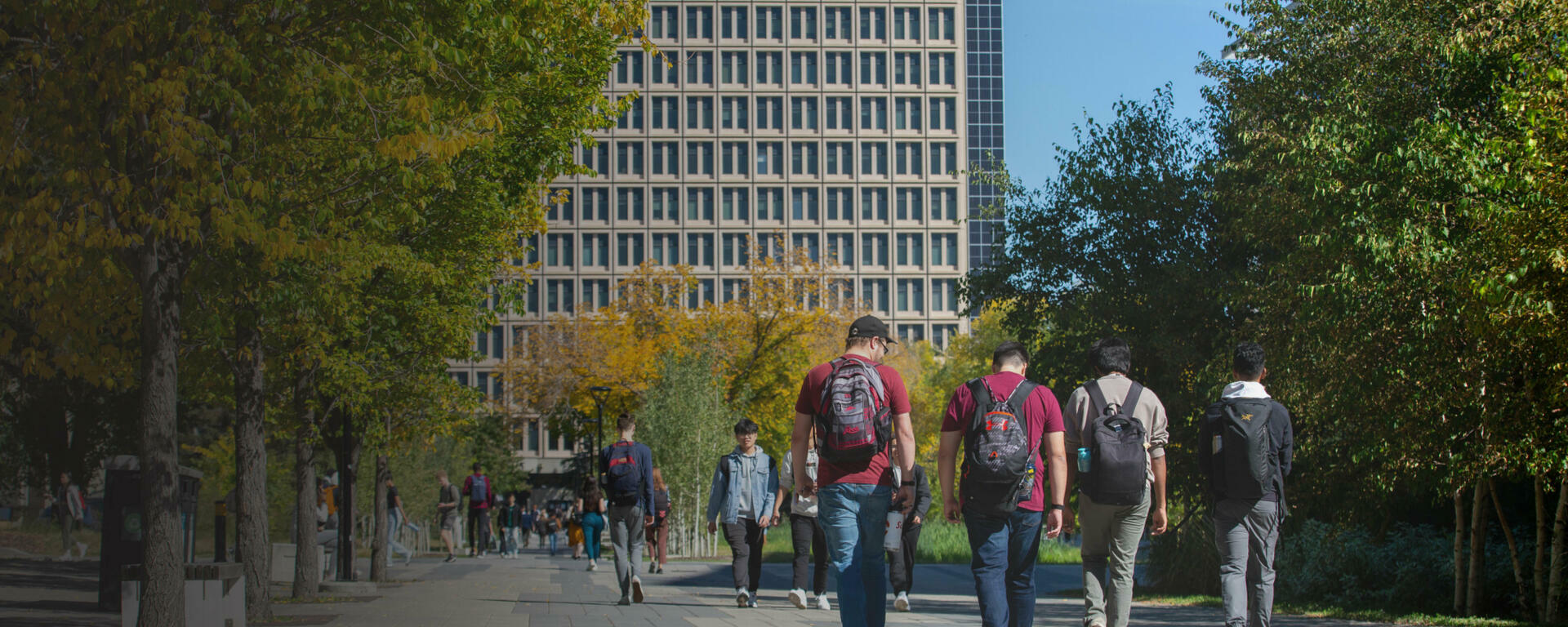 Students walking towards FOA Building