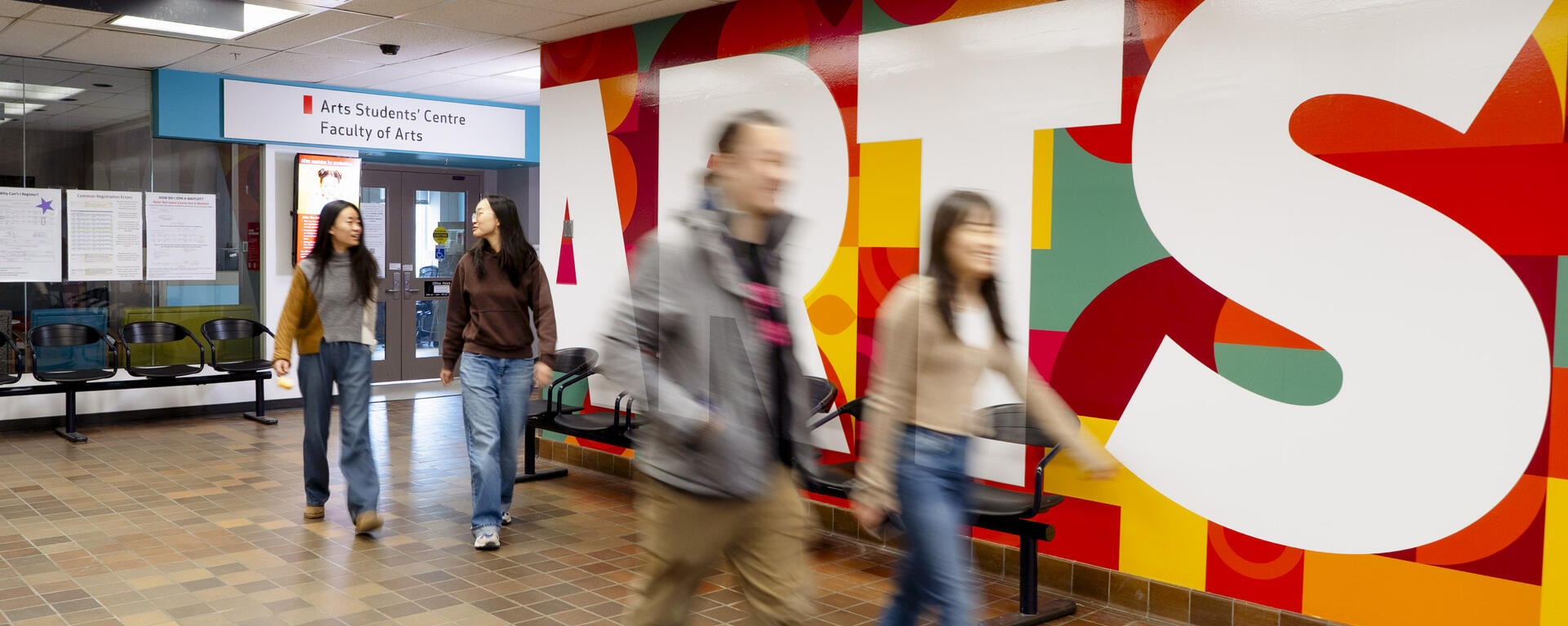 Students walk by the Arts Students' Centre