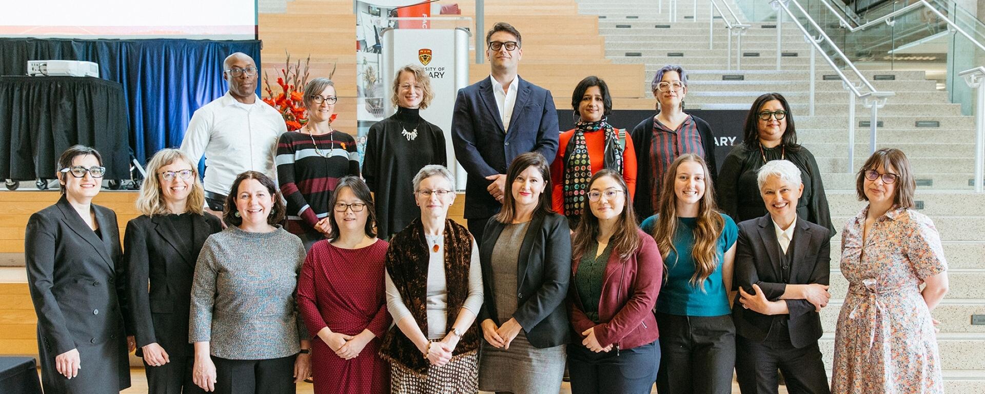A group portrait of 2025 Arts Awards recipients with the dean and associate dean, graduate