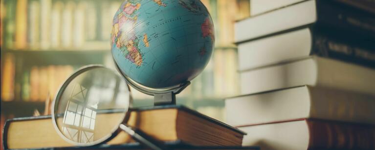 World globe on book