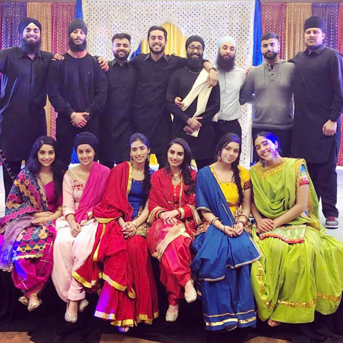 Members of the Sikh Students' Association showcase a Sikh Wedding for Sikh Awareness week at the University of Calgary. They are wearing dress clothes and ghaghra, or traditional Punjabi wear