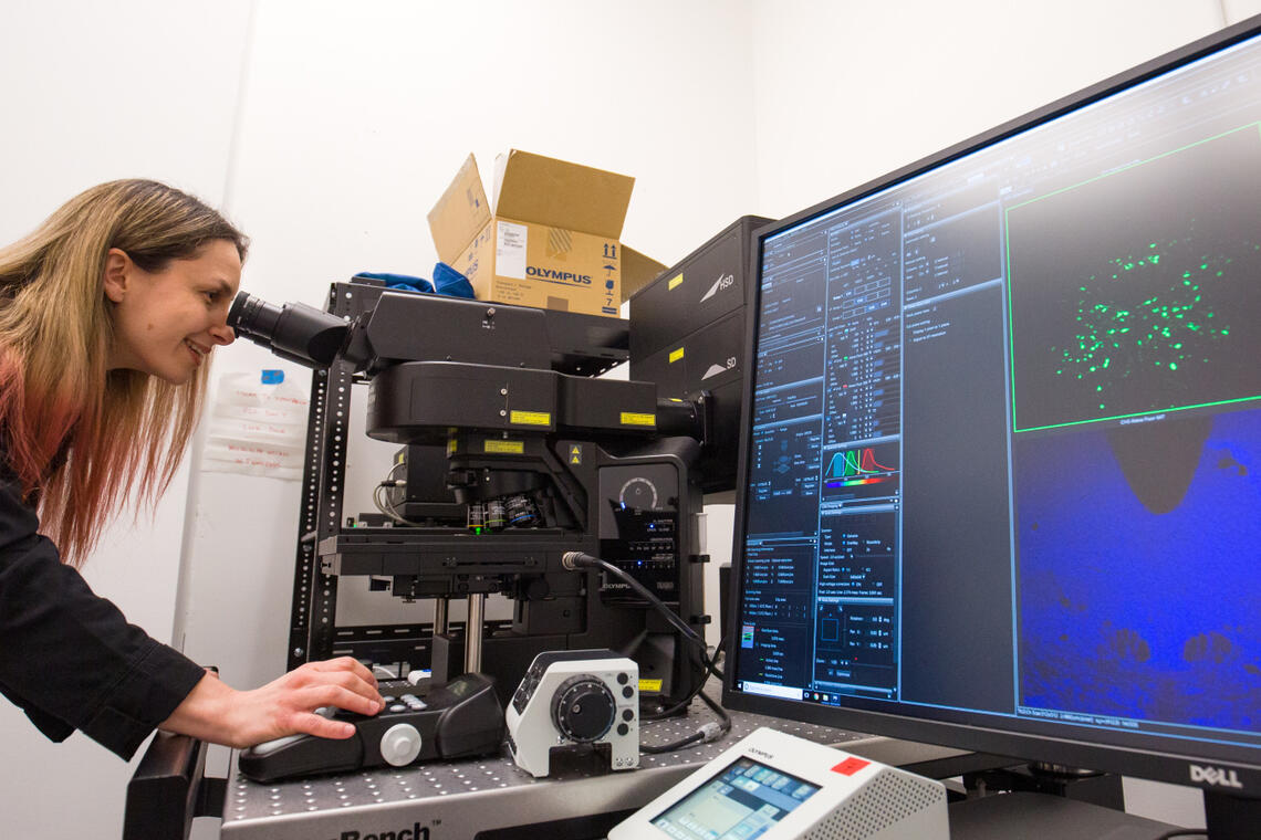 Student works with very cool equipment and computer 