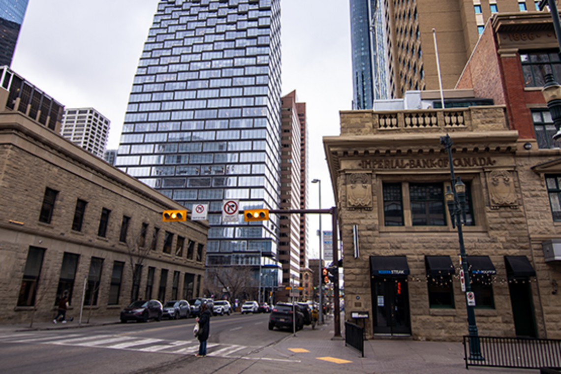 Calgary Alberta Canada, April 03 2024: Downtown city view of historic buildings and popular landmarks at an intersection. 