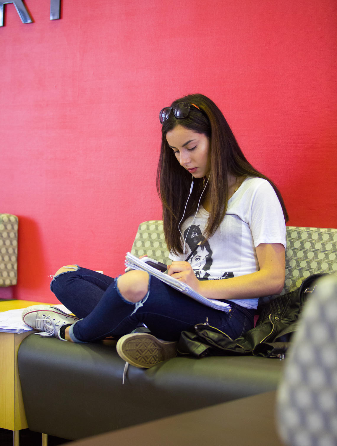 UCalgary student studying in Social Sciences Building