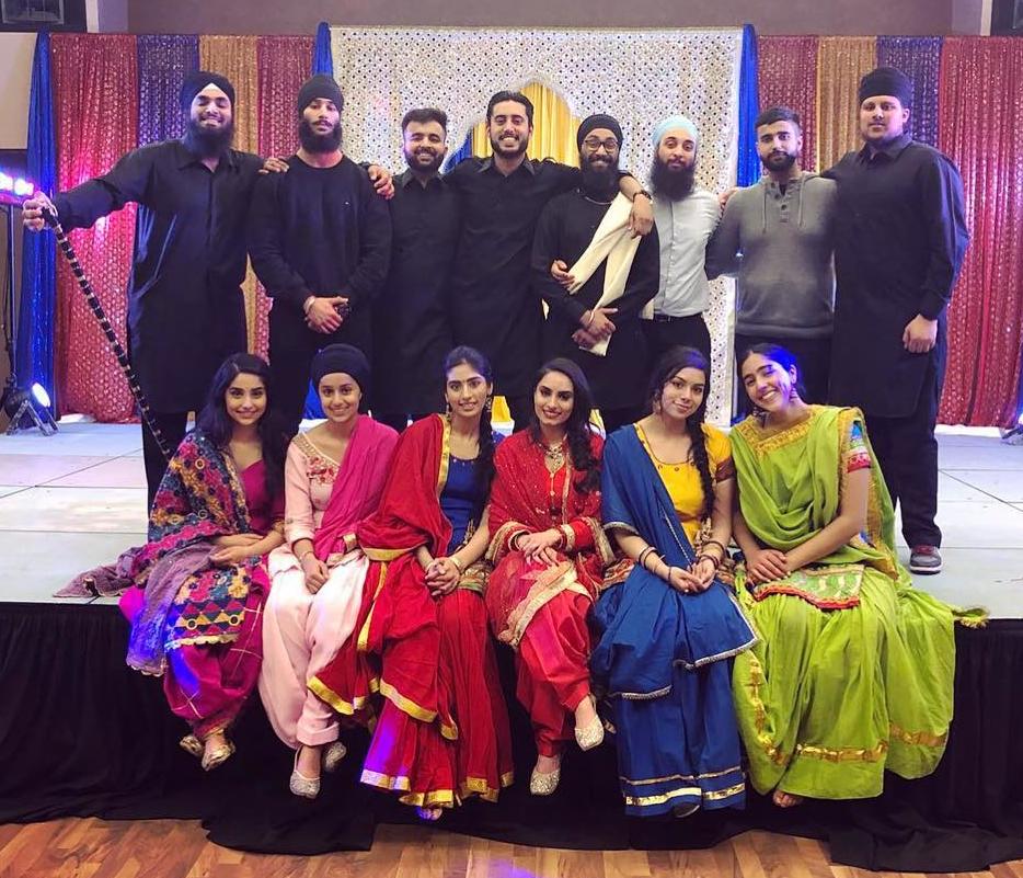 Members of the Sikh Students' Association showcase a Sikh Wedding for Sikh Awareness week at the University of Calgary. They are wearing dress clothes and ghaghra, or traditional Punjabi wear