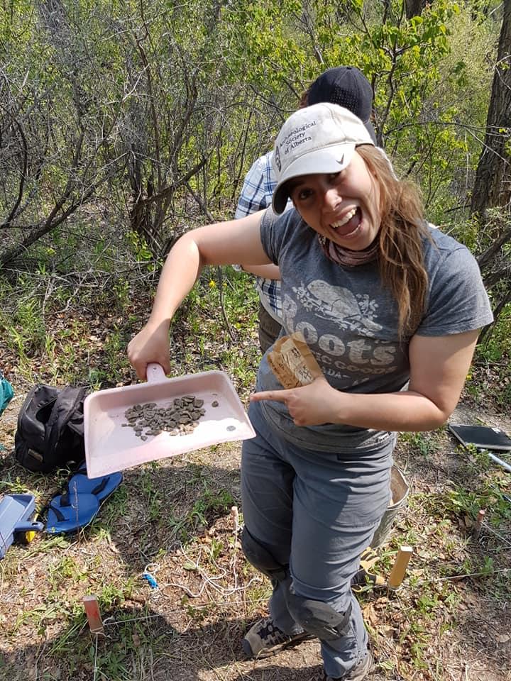 Person at Cluny site holds up samples