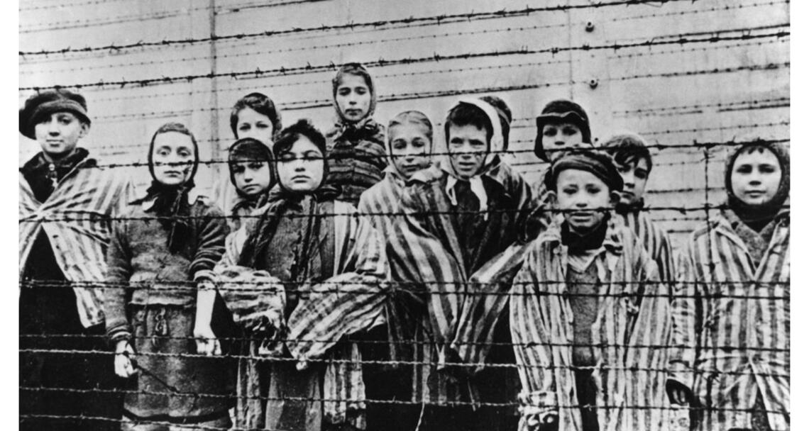 A group of children at the Auschwitz concentration camp after its liberation by the Soviet Army in January 1945.