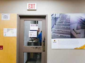 A photo of the placard that is placed in the lobby of Social Sciences marking the restoration of Leon the Frog