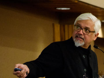 Amitav Ghosh with ASL interpreter