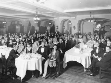 Group photo of the Canadian Authors Association Banquet 1928 in a ballroom at the Banff Springs Hotel