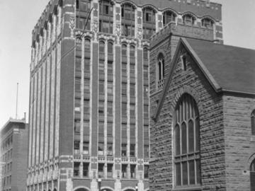 Historic Calgary Herald Building with Central Church in the foreground