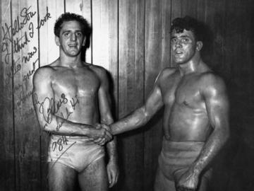 Photo of wrestlers James Blears and Stu Hard shaking hands