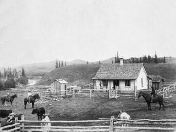 A black and white archival photo of the John Ware ranch at Millarville, Alberta.