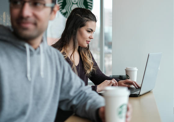 students studying at a coffee shop