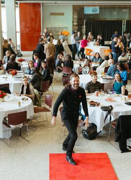 A recipient walking to the stage