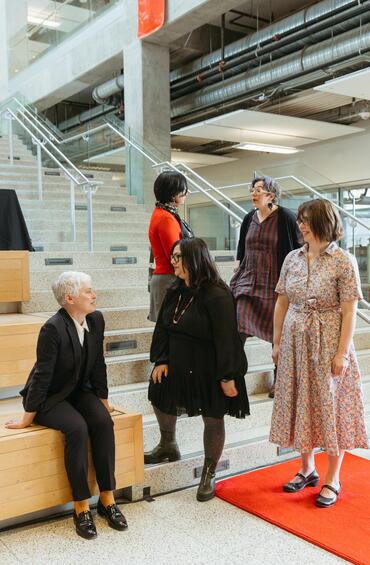 People chatting at the event