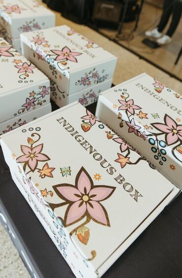 Several indigenous boxes on a table