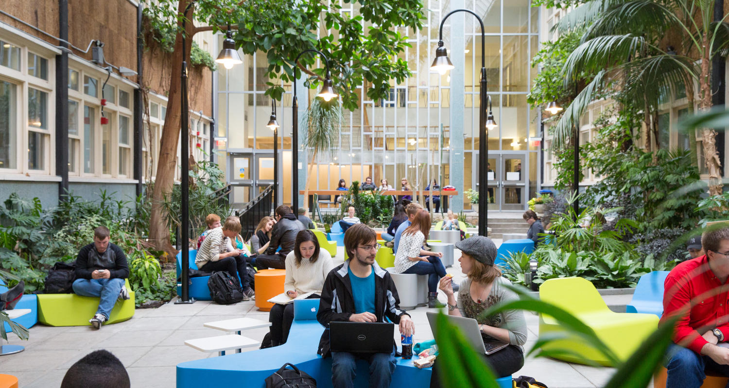 Students studying in the atrium