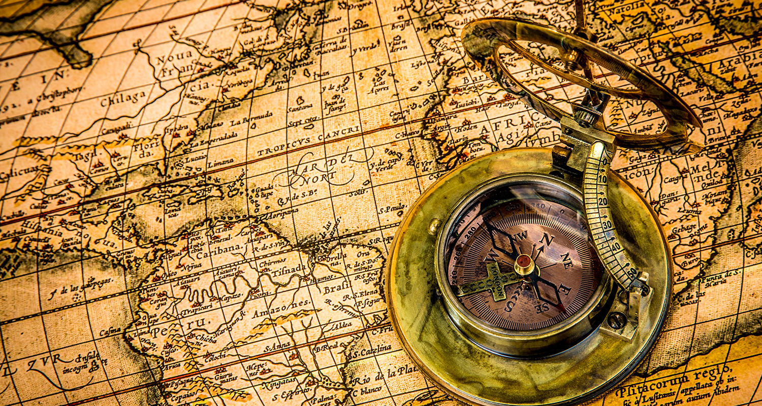 Stock image: A compass on top of a map