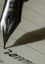 pen writing on paper