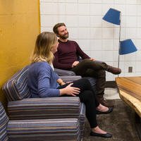 People chat inside one of the UCalgary Psychology Clinic's interview rooms