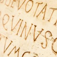 PRe-Christian latin writing carved on a tombstone
