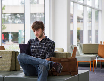 UCalgary Philosophy student using a tablet
