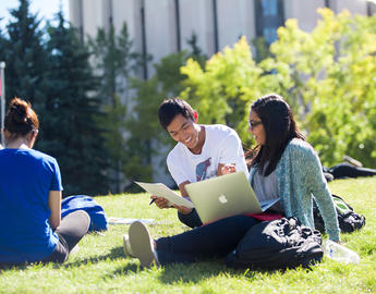 UCalgary students on the grass