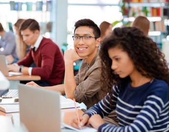 Stock photo: students work together with laptops
