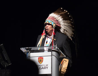 Indigenous speaker at a ceremony